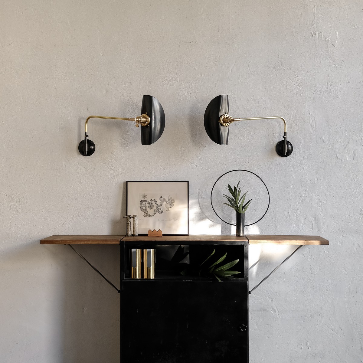 Custom made brass swing wall lamp